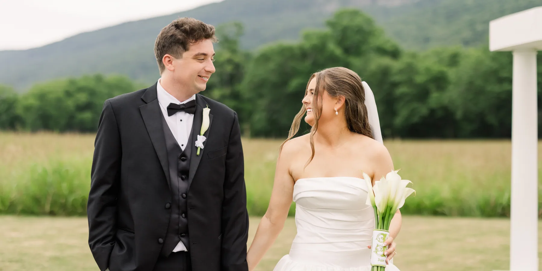 A couple walking together in the meadow