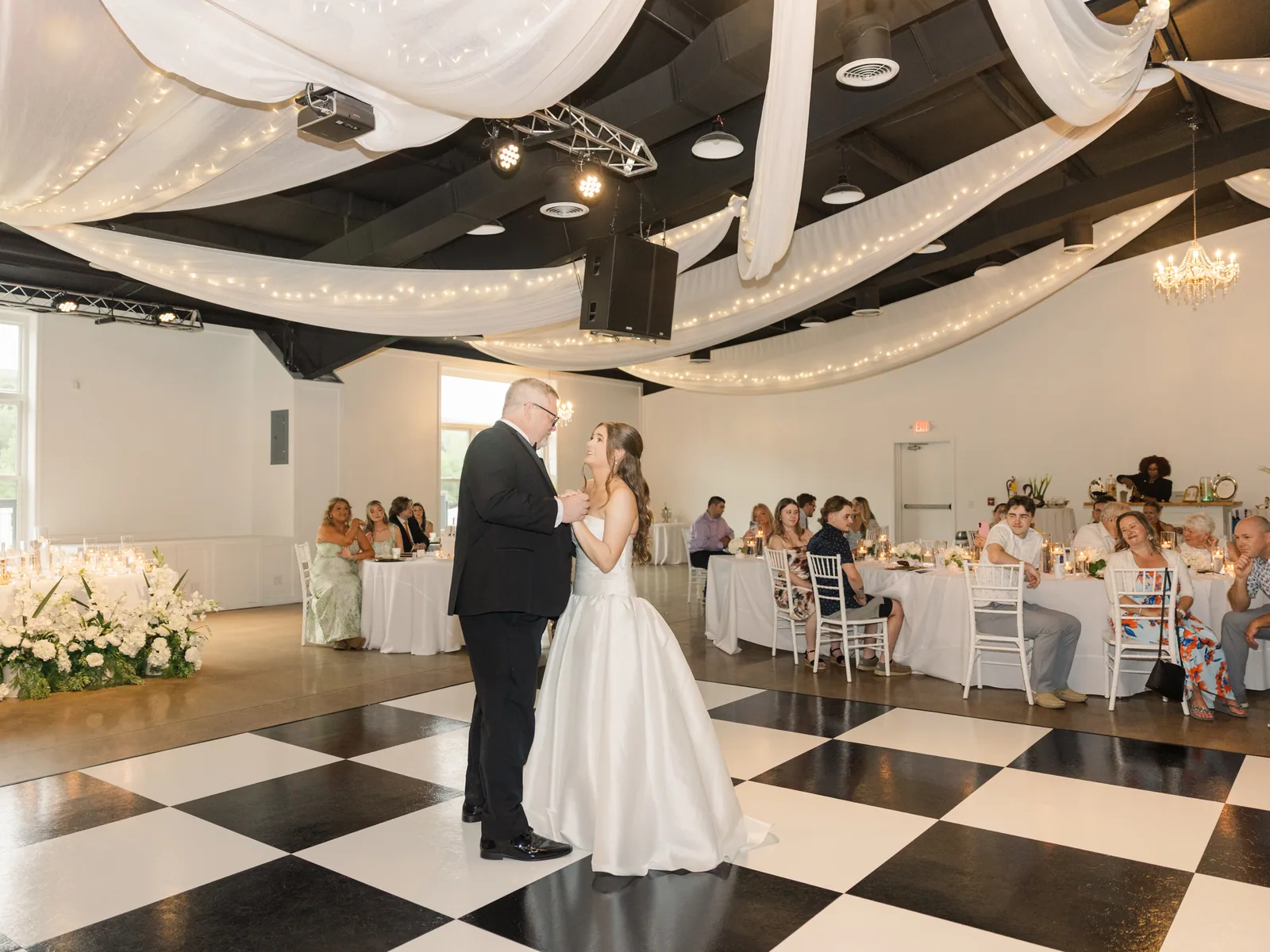 Davis Hall under its drapery, lit for the first dance