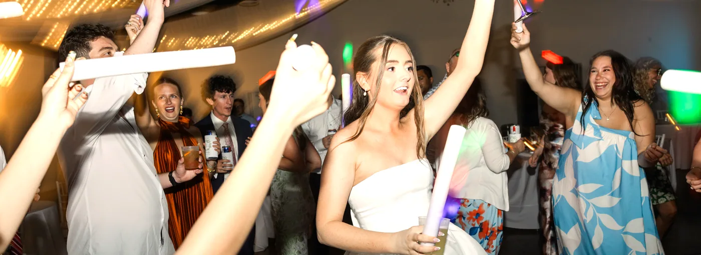 The dance floor late, glow sticks up