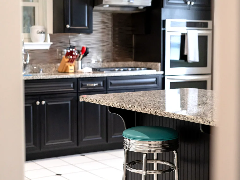The kitchen: a double oven, and an island to work around