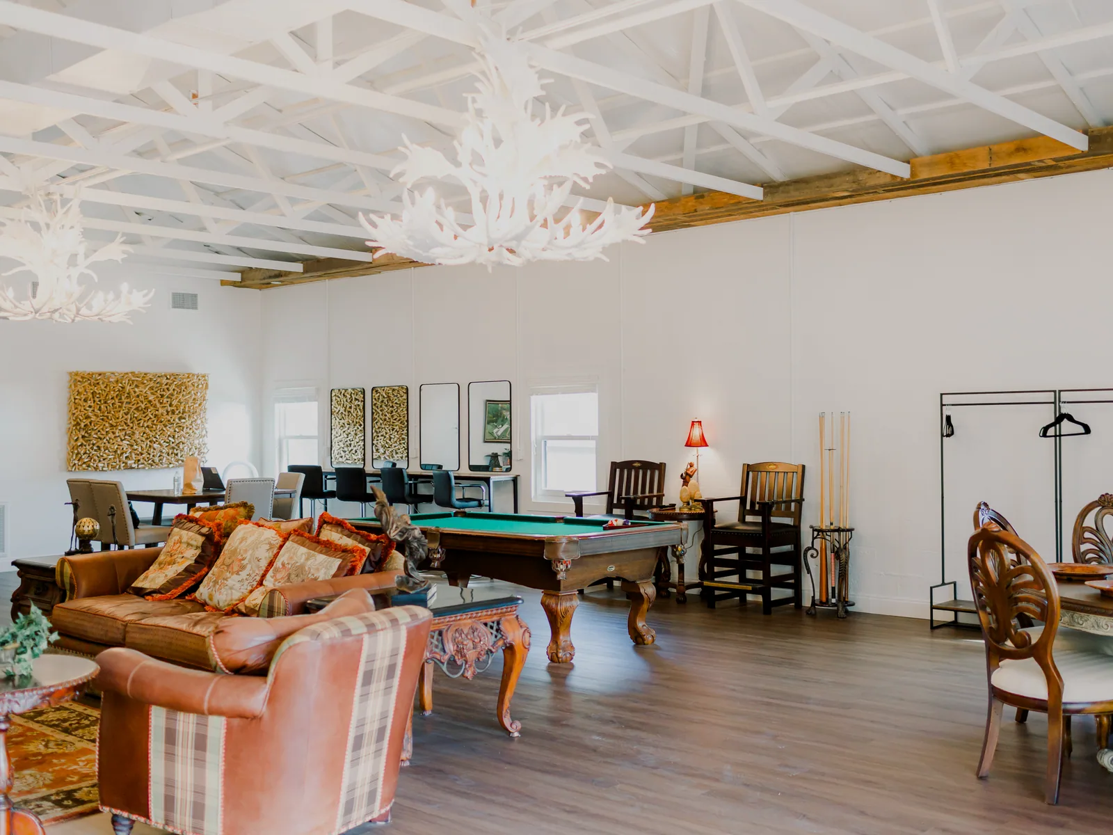 The Mahogany Suite, the pool table under antler chandeliers