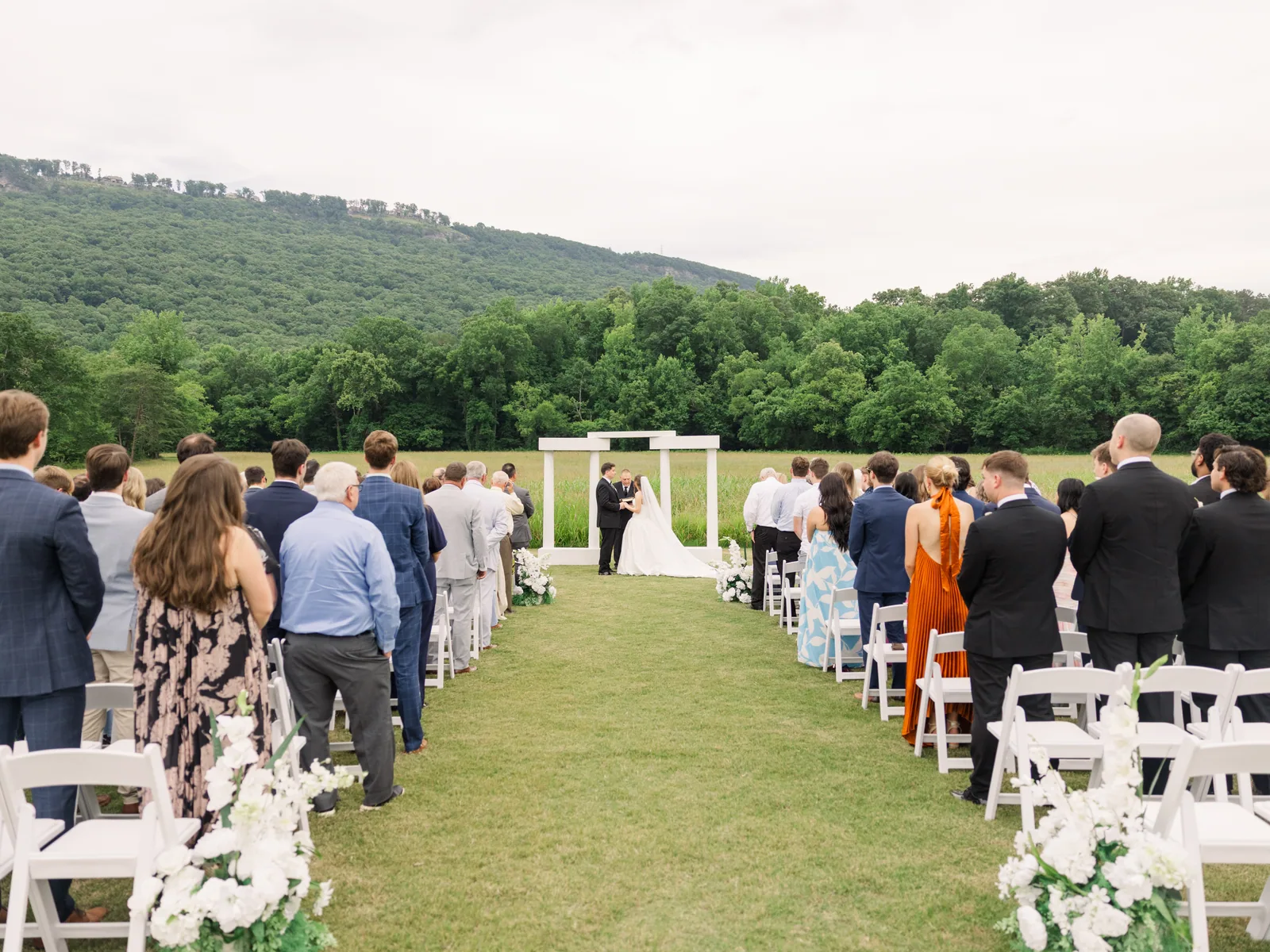 The processional crossing the meadow