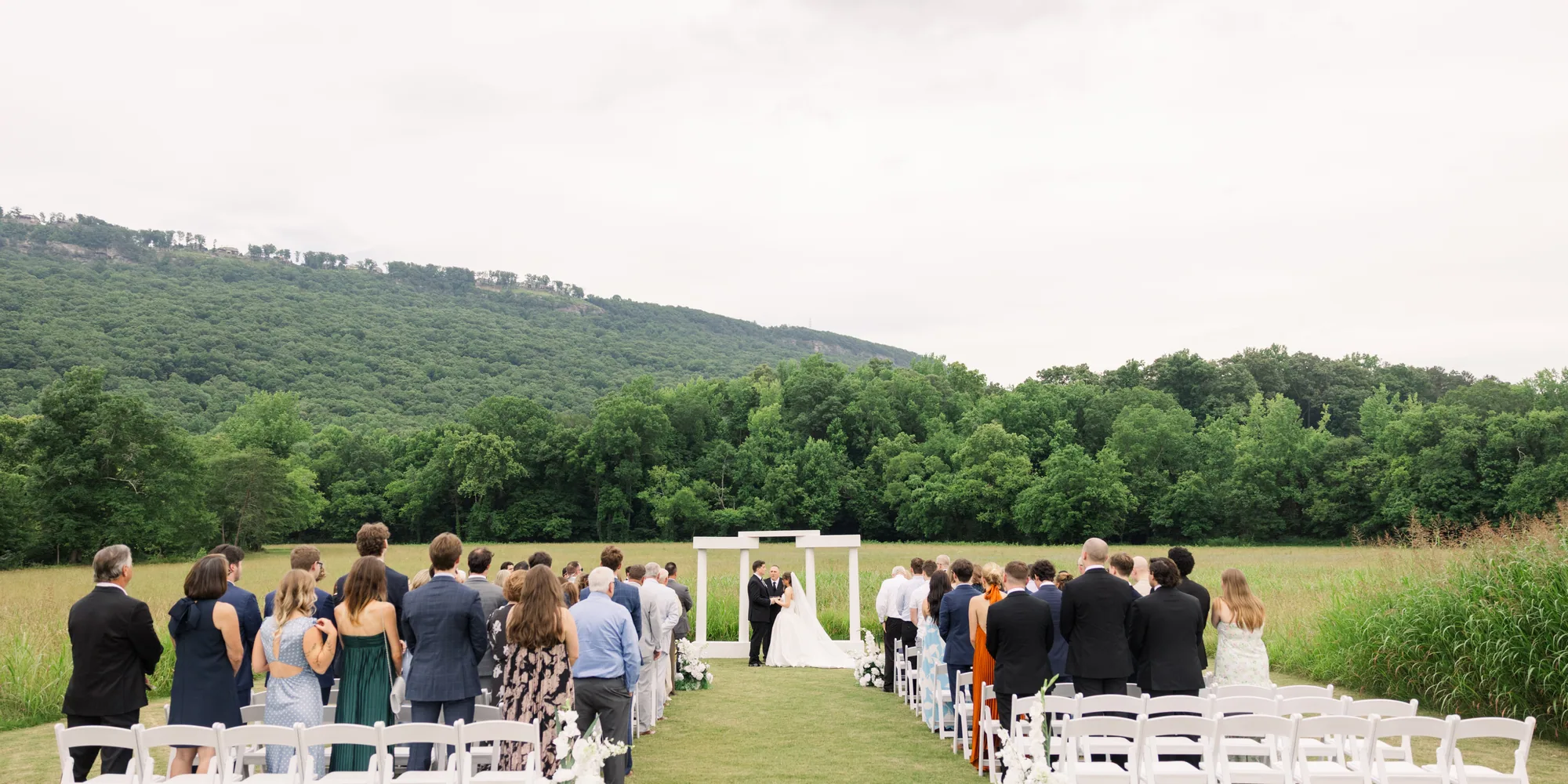 A ceremony under way in the meadow